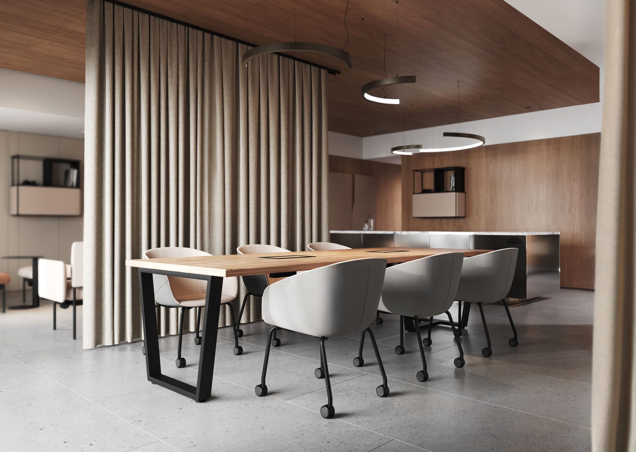 Gestoffeerde vergaderstoelen OXCO van Bejot met wielen bij een industriële tafel.